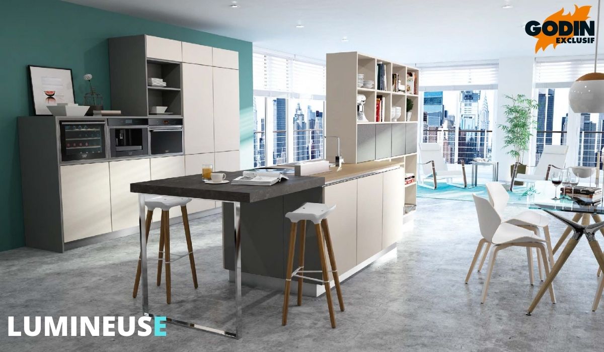 Cuisine ouverte lumineuse avec îlot et rangements intégrés dans un espace contemporain.